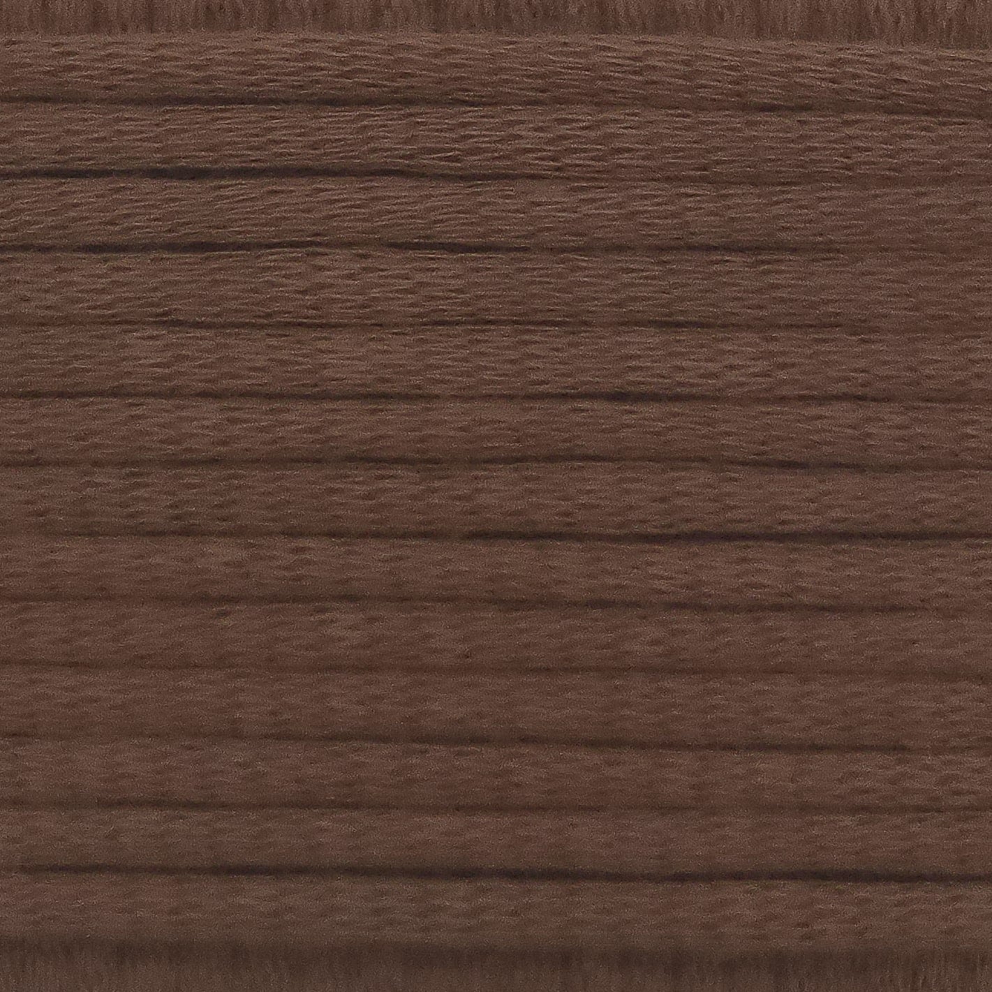 A close-up image showing the texture of a chocolate brown coloured yarn that is friendly for crochet beginners.