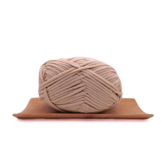 A skein of almond nude coloured yarn for crochet beginners.