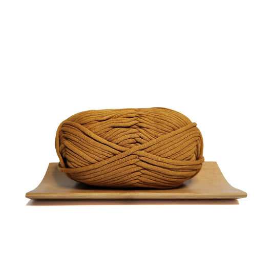 This is a skein of caramel brown coloured yarn for crochet beginners.