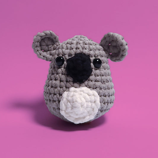 Mandy the Koala crochet amigurumi, a cuddly companion from our beginner-friendly crochet kits. Handcrafted with care, Mandy features a charming design perfect for beginners and koala enthusiasts. Front view.