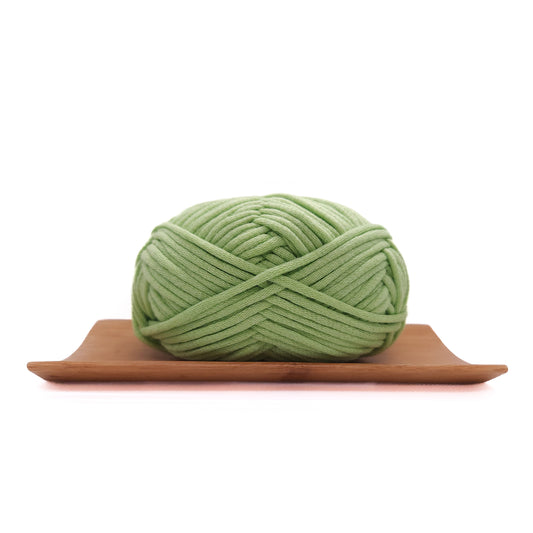 A skein of matcha green coloured yarn for crochet beginners.