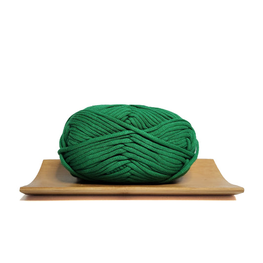 A skein of moss green coloured yarn for crochet beginners.