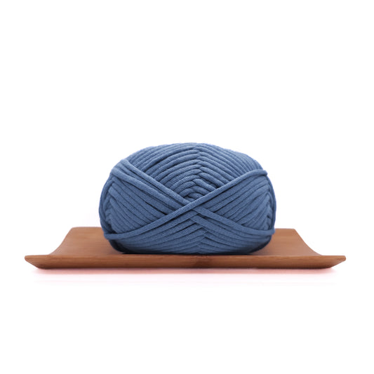 A skein of royal blue coloured yarn for crochet beginners.