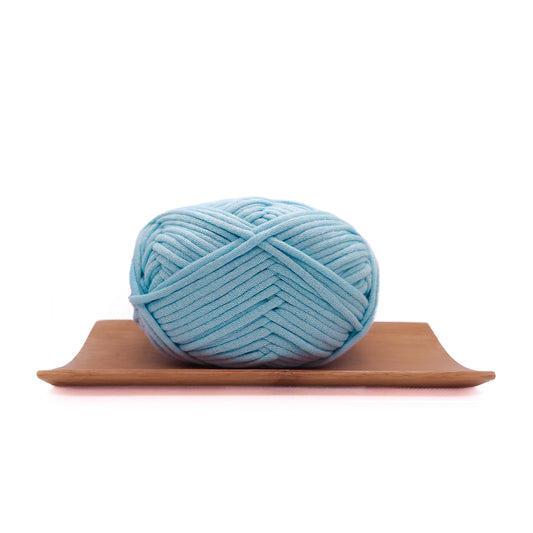 A skein of sky blue coloured yarn for crochet beginners.