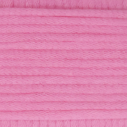 A close-up image showing the texture of a summer pink coloured yarn that is friendly for crochet beginners.