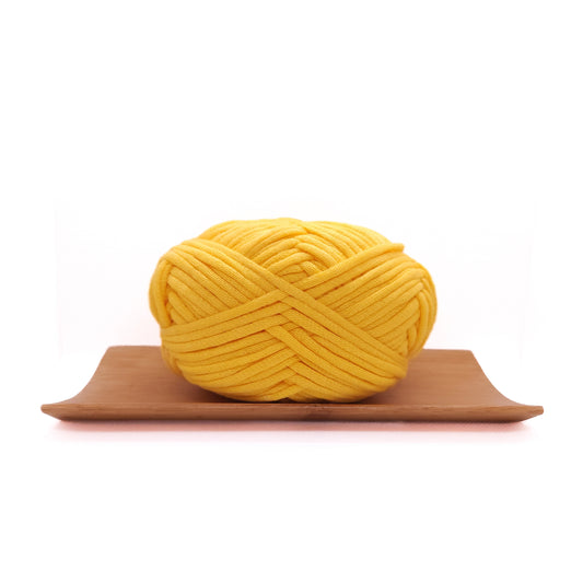 A skein of sunshine yellow coloured yarn for crochet beginners.